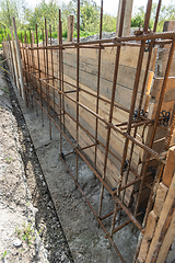Image showing Tied rebar and mounted formwork close-up