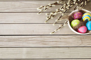 Image showing colored easter eggs and pussy willow branches