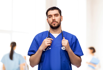 Image showing doctor or male nurse with stethoscope