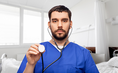 Image showing doctor or male nurse with stethoscope