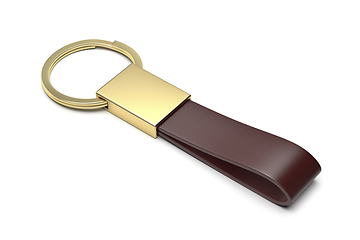 Image showing Gold keychain with leather strap