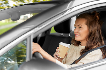 Image showing woman or female driver with coffee driving car