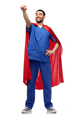 Image showing smiling doctor or male nurse in superhero cape