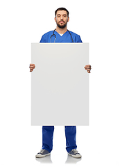 Image showing male doctor or nurse with big white board