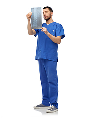 Image showing doctor or male nurse looking at x-ray scan