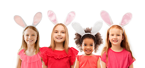 Image showing happy girls wearing easter bunny ears headbands