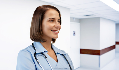 Image showing smiling female doctor or nurse at hospital