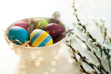 Image showing colored easter eggs and pussy willow branches