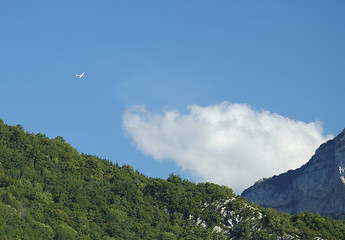 Image showing A glider flying over Alps