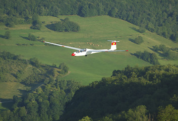 Image showing A glider Janus flying over Challes les eaux 