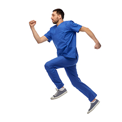 Image showing doctor or male nurse jumping in air