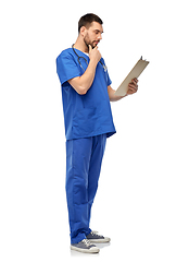 Image showing doctor or male nurse with clipboard