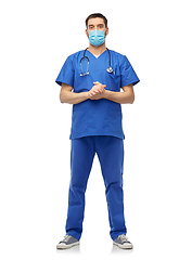 Image showing male doctor in blue uniform and mask