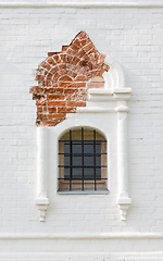 Image showing Figured Window In Ancient White Brick Wall