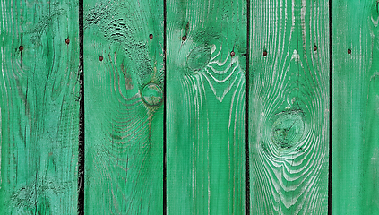 Image showing Texture of weathered wooden green painted fence