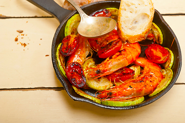 Image showing roasted shrimps with zucchini and tomatoes