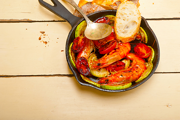 Image showing roasted shrimps with zucchini and tomatoes