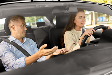 Image showing car driving school instructor teaching woman