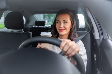 Image showing woman or female driver with coffee driving car