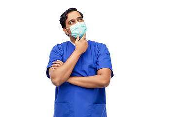 Image showing indian male doctor in blue uniform and mask