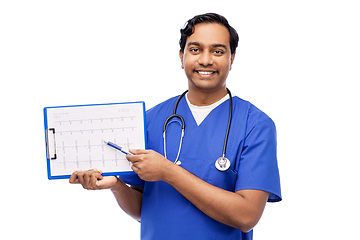 Image showing smiling male doctor with cardiogram on clipboard