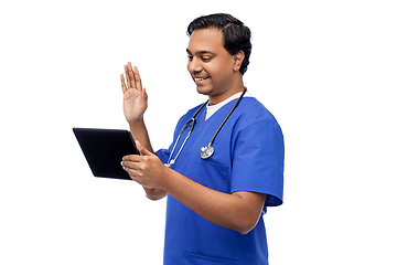 Image showing doctor or male nurse has video call on tablet pc