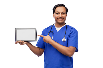 Image showing happy doctor or male nurse showing tablet computer