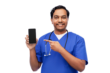 Image showing happy indian doctor or male nurse with smartphone