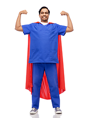 Image showing smiling doctor or male nurse in superhero cape