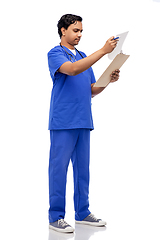 Image showing indian male doctor with report on clipboard