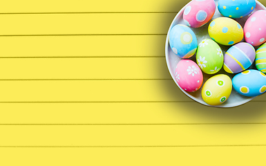 Image showing close up of colored easter eggs on plate