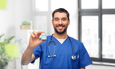 Image showing doctor or male nurse with medicine and stethoscope