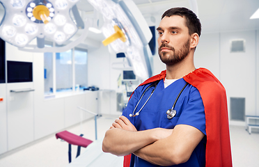 Image showing doctor or male nurse in superhero cape at hospital