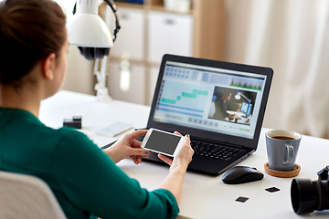 Image showing woman smartphone and laptop working at home