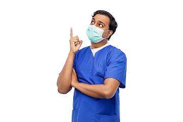 Image showing indian male doctor in blue uniform and mask