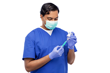 Image showing indian doctor in mask with syringe and medicine