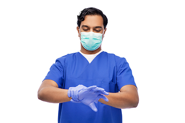 Image showing indian male doctor in uniform, mask and gloves