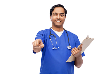 Image showing smiling doctor or male nurse pointing to camera