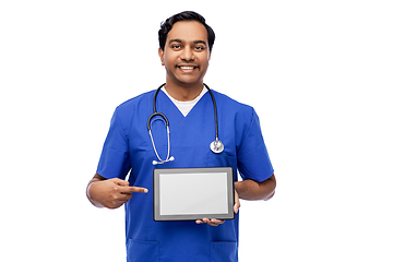 Image showing happy doctor or male nurse showing tablet computer