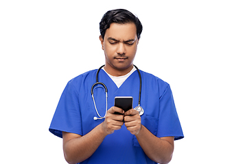 Image showing indian doctor or male nurse using smartphone