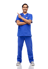 Image showing happy indian doctor or male nurse with stethoscope