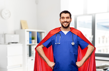 Image showing smiling doctor or male nurse in superhero cape