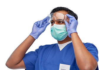 Image showing indian male doctor in blue uniform and mask