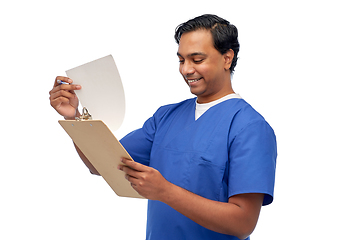 Image showing happy indian male doctor with clipboard