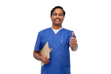 Image showing smiling doctor or male nurse showing thumbs up