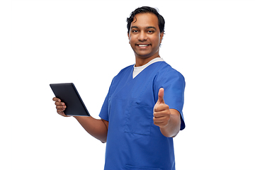 Image showing male doctor with tablet pc showing thumbs up