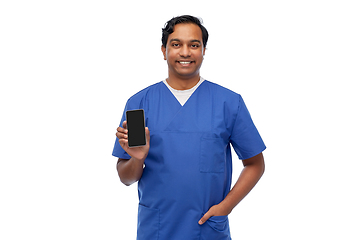 Image showing smiling doctor or male nurse with smartphone