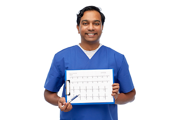 Image showing smiling male doctor with cardiogram on clipboard