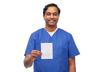 Image showing indian doctor or male nurse with prescription