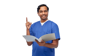 Image showing indian male doctor with folder pointing finger up